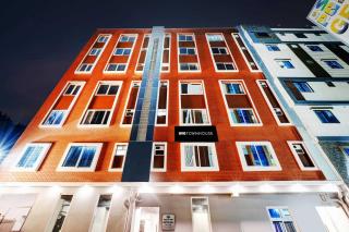 Super Townhouse Ecity Inn - 0