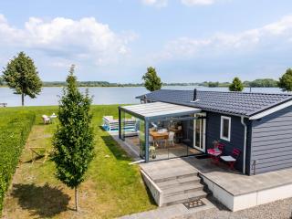 Strandperle Lathum Ferienhaus in Premium Lage am See für Urlaub und Workation mit Hundestrand - 9