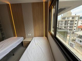 Cód 71 - Apartamento novo a 180 metros do mar - 1