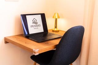 Boho Beige Apartment - Walkable to Beach with Workspace, Fast WiFi, AC & Full Kitchen - 1