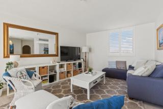 2-Bed Coastal Escape Steps from the Sand - 9