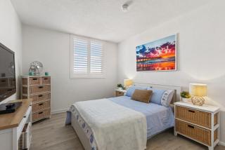 2-Bed Coastal Escape Steps from the Sand - 5