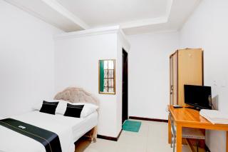 OYO 94775 Palm Cafe Inn - 1