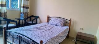 Cozy Guest Room in Kinshasa with Balcony and Partial Air-Conditioning - 3
