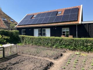 Knus Afke appartement aan het water in Jorwert - 4