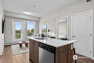Best Location Inglewood with 2 Bedrooms and Heated Underground Parking - 1