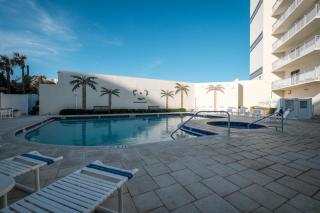 Stunning direct oceanfront condo with a balcony, hot tub, and heated pool - 4
