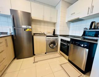SUNRISE HOMES - Stunning 1BR Marina View near Beach walk - 2