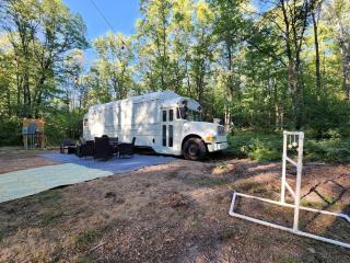 Rustic Converted School Bus with Outdoor Shower Near ORV Trails in Manistee National Forest, Michigan - 1