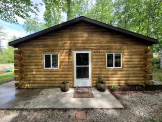 Cozy Lakeside Log Cabin with Kayaks & Arcade Access near Trails in Bitely, Michigan - 0