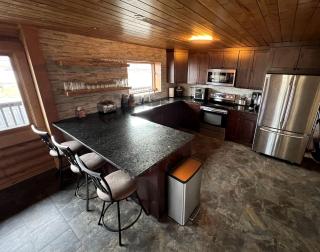 Scenic Vacation Home with Wrap-Around Deck Overlooking Ennis Lake near McAllister, Montana - 8