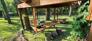 Tree House Glamping Destination near the Ozarks, with River Access for Swimming and Fishing - 1