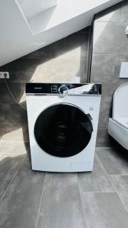 Charming Attic Retreat with Sloped Roof - 6