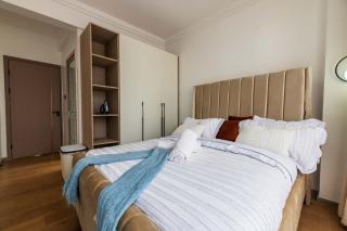 Royal essence apartment with swimming pool ,ample parking ,fully equipped gym, child playground and amazing scenic city view - 1
