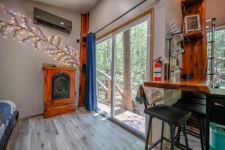 Cozy Tiny Cabin with Porch & Fire Pit near Scenic Trails in Western Arkansas - 2