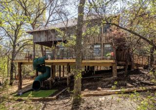 Magical Treehouse with Slide by Brazos River for Family Glamping Adventures in Texas - 0