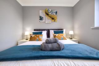 Spotless Two-Bedroom Home with Garden and Parking - 9