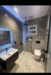 A cozy two-bedroom apartment with a living room and a patio that inspires relaxation - 3