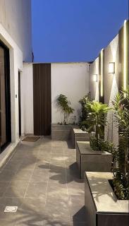 A cozy two-bedroom apartment with a living room and a patio that inspires relaxation - 1
