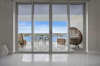 Waterfront 2BR Unit with Bayview Boho Style Stunning Sunset Pool Hot Tub Gym - 3