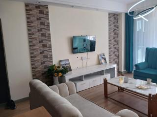 serene stays apartment with fully equipped gym , heated swimming pool ,private parking space and amazing scenic views - 4