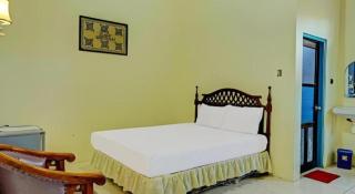 Hotel O Tri Homestay - 9