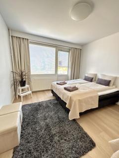 Central 1BR Apartment with Balcony & Free Parking - 2