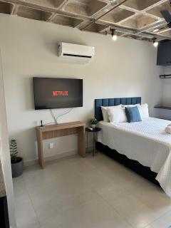 Studio Premium - Perto de Tudo - Vista Livre - Estacionamento privativo e Portaria 24h - Wi-Fi 600mbps - 6