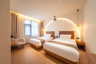 Floral Hotel Xidi Jiuheboshe B&B - Huangshan - 4