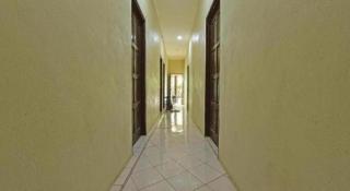 OYO 90596 Casaria Inn - 3