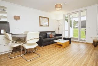 Terrasse, gratis Nutzung vom AHOI Erlebnisbad und Sauna in Sellin - Meeresblick FeWo 11 - 4