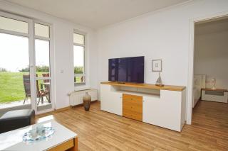 Terrasse, gratis Nutzung vom AHOI Erlebnisbad und Sauna in Sellin - Meeresblick FeWo 11 - 3