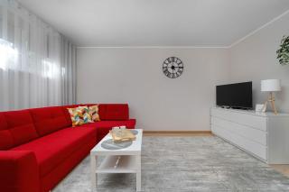 Red Apartment in Wrocław with Two Bedrooms and Desk for Remote Work by Noclegi Renters - 5