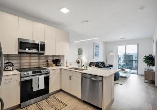 Pool with Free Covered Parking and Washer & Dryer in Unit - 9