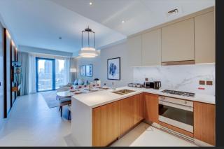 Prestige 2BR Opera Suite - Spacious Comfort, Pool & Gym - 9