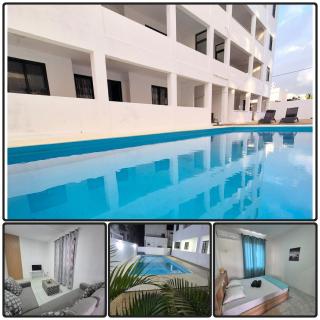 Skyview Apartment- Poolside Stay Near the Beach - 0