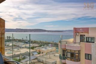 A 2BR designer seafront home with Wifi, AC and Beach by 360 Estates - 0