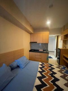 Apartemen Anderson 28 Pakuwon mall Luxury Studio Apartment Connecting Mall, Pool & City View - 5