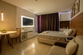 Suíte luxo com tela de cinema no América Towers Studio Residence - 5