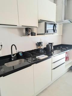 Studio Xavante 308A - novo, confortável, com garagem coberta e portaria 24h - 1