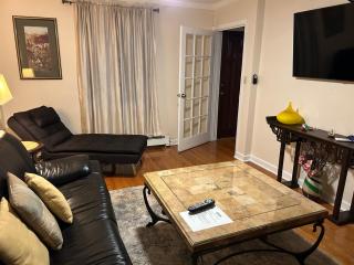 Charming 2 Bedroom One Block from UBS Arena! - 4