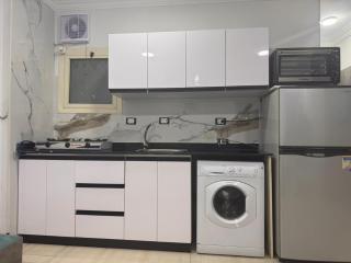 Modern 2BR Apartment Pool View in El Kawther - 5