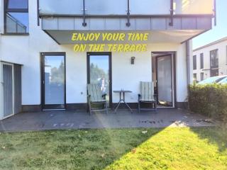 Modernes Apartment mit Terrasse & Garten, Parkplatz & Self-Check-in - 8