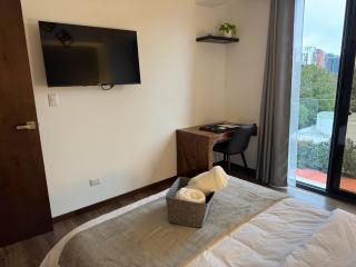 Luxury One-Bedroom City Views, Pool & AC - 8