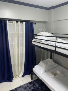 Affordable 2BR Near Airport with WiFi, Netflix and Pool - 1