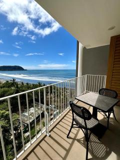 Serene and Modern Beachfront Condo with Ocean Views - 7