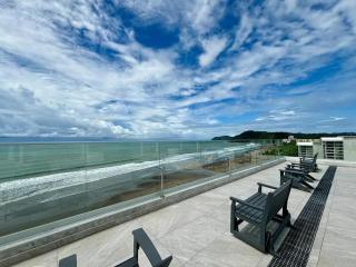 Serene and Modern Beachfront Condo with Ocean Views - 1