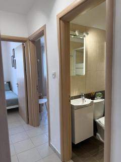 Salt & Kozee 2BR Cozy Flat with Pool Access - Near Beaches - 1