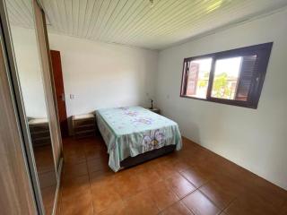 Residência veraneio, sozinha no pátio - 5