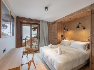 Appartement neuf, sauna, cheminée, accès pistes, parking couvert, balcon ensoleillé. - FR-1-565-92 - 2